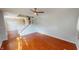 Inviting living room featuring hardwood floors and a stairway at 2259 Colfax Ln # 2259, Indianapolis, IN 46260