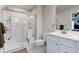 This bathroom features a glass shower and a toilet with a white vanity at 2500 Sand Hollow Dr, Lebanon, IN 46052