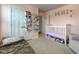This bedroom includes a crib, hanging storage, and a side chair at 2500 Sand Hollow Dr, Lebanon, IN 46052