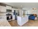Open kitchen area with stainless appliances and granite countertops at 2500 Sand Hollow Dr, Lebanon, IN 46052