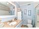 Well-lit bathroom with a vanity and a mirror, plus tiled flooring at 26858 State Road 19, Arcadia, IN 46030