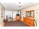 Bedroom with wood floors, closet space, dresser and accent chair at 26858 State Road 19, Arcadia, IN 46030