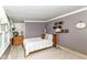 Serene bedroom featuring soft carpeting, warm decor, and ample space for relaxation at 26858 State Road 19, Arcadia, IN 46030