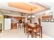 Bright dining area with dark wood table, seating for four, and easy access to the kitchen at 26858 State Road 19, Arcadia, IN 46030