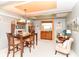 Inviting dining room featuring a wooden table, plush seating, and natural light, perfect for Gathering gatherings at 26858 State Road 19, Arcadia, IN 46030