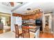 Well-appointed kitchen with oak cabinets, gas cooktop, and decorative tile accents at 26858 State Road 19, Arcadia, IN 46030