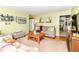Cozy living room featuring neutral tones, comfortable seating, and carpeted floors at 26858 State Road 19, Arcadia, IN 46030