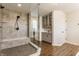 Stunning bathroom showcases a glass-enclosed shower and custom cabinetry at 2783 W High Grove Cir, Zionsville, IN 46077