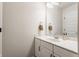 Well-lit bathroom featuring a white vanity with marble countertop and a modern faucet and towel rack at 2783 W High Grove Cir, Zionsville, IN 46077