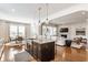 Open floorplan featuring kitchen, living area, and additional dining, perfect for entertaining at 2783 W High Grove Cir, Zionsville, IN 46077