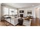 Spacious living room boasts a fireplace, large windows, and neutral decor at 2783 W High Grove Cir, Zionsville, IN 46077