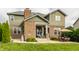 Charming home with a spacious patio, perfect for outdoor dining and relaxation with lush landscaping at 2783 W High Grove Cir, Zionsville, IN 46077