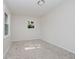 This bedroom features carpet and a window at 2807 Carla Ct, Indianapolis, IN 46219