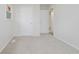 Bedroom with neutral carpet, closet, and adjacent bathroom entry at 2807 Carla Ct, Indianapolis, IN 46219