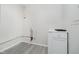 Utility room with white cabinet and updated plumbing at 2807 Carla Ct, Indianapolis, IN 46219