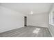 Neutral living area showcasing updated flooring and ample natural light at 2807 Carla Ct, Indianapolis, IN 46219