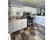 Practical kitchen with essential appliances and checkered tile flooring at 2826 Falcon Dr, Indianapolis, IN 46222