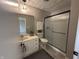 Bathroom showcasing shower, toilet, vanity with mirror, and accent lighting at 2845 12Th St, Columbus, IN 47201