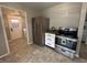 Kitchen area with stainless steel appliances, neutral walls, and modern cabinets at 2845 12Th St, Columbus, IN 47201