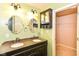 Bathroom featuring double sinks, granite counters, and a framed mirror above the vanity at 3067 Stilton Dr, Cicero, IN 46034