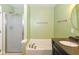 Clean bathroom with a tub, shower, and vanity, providing essential fixtures for relaxation and hygiene at 3067 Stilton Dr, Cicero, IN 46034