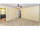 Spacious bedroom with en-suite bathroom access, carpeted floor, and neutral wall color at 3067 Stilton Dr, Cicero, IN 46034
