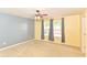 Comfortable bedroom with ceiling fan and windows offering plenty of natural light and outside views at 3067 Stilton Dr, Cicero, IN 46034