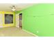Bedroom with a ceiling fan, carpeted floors, and a unique painted chalkboard at 3067 Stilton Dr, Cicero, IN 46034