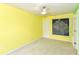 Well-lit bedroom with fan, carpet, and access to the hallway, for comfortable and convenient living at 3067 Stilton Dr, Cicero, IN 46034