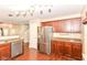 Kitchen with stainless steel appliances, granite countertops and hardwood floors at 3067 Stilton Dr, Cicero, IN 46034