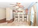 Kitchen with barstool seating, stainless steel appliances and hardwood floors at 3067 Stilton Dr, Cicero, IN 46034