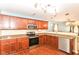 Kitchen with stainless steel appliances, granite countertops and hardwood floors at 3067 Stilton Dr, Cicero, IN 46034