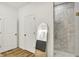 Primary bathroom showcases a glass shower with marble tile surround and dual sink vanity at 35 N Keystone Ave, Indianapolis, IN 46201
