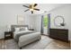 Comfortable bedroom with large window and hardwood floors at 4223 Kestrel Ct, Indianapolis, IN 46254