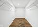 Spacious walk-in closet features custom shelving and hardwood floors at 4223 Kestrel Ct, Indianapolis, IN 46254