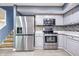 Modern kitchen featuring stainless steel appliances, sleek counters, and stylish cabinetry at 4223 Kestrel Ct, Indianapolis, IN 46254