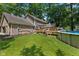 Spacious backyard featuring an above-ground pool, multi-level deck, and lush green lawn at 429 Glenbrook Ln, Avon, IN 46123