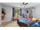 Fun themed bedroom with brightly colored decor and a window view at 429 Glenbrook Ln, Avon, IN 46123