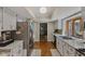 Functional kitchen with stainless steel appliances and hardwood flooring at 429 Glenbrook Ln, Avon, IN 46123