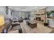 Inviting living room featuring a brick fireplace, plush seating, and natural light at 429 Glenbrook Ln, Avon, IN 46123