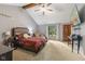 Bright main bedroom boasts high ceiling, ceiling fan, and view to backyard at 429 Glenbrook Ln, Avon, IN 46123