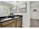 Modern bathroom featuring double sinks, wooden cabinets, and stylish decor at 4379 Red Pine Dr, Bargersville, IN 46106