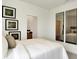 Serene bedroom with elegant mirrors, framed artwork, and a cozy bed at 4379 Red Pine Dr, Bargersville, IN 46106