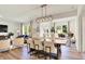 Bright, open concept dining and living area with modern decor and ample natural light at 4379 Red Pine Dr, Bargersville, IN 46106