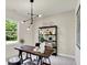 Bright office with wooden desk, modern lighting, and a view to the outdoors at 4379 Red Pine Dr, Bargersville, IN 46106