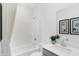 Clean bathroom features a shower-tub combo, stylish mirror, and a vanity with a modern faucet at 4382 Red Pine Dr, Bargersville, IN 46106