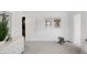 Bright bedroom with white walls, gray carpet, a white dresser and adorable wall art at 4382 Red Pine Dr, Bargersville, IN 46106