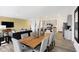 Open-concept dining and living area with abundant natural light, ideal for modern living at 4382 Red Pine Dr, Bargersville, IN 46106