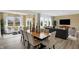 Bright and airy living room featuring large windows, hardwood floors, and stylish modern decor at 4382 Red Pine Dr, Bargersville, IN 46106