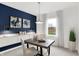Stylish home office with built-in storage, designer lighting, and a view of the outdoors at 4382 Red Pine Dr, Bargersville, IN 46106